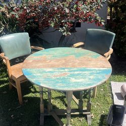Shabby chic table . Drop down sides