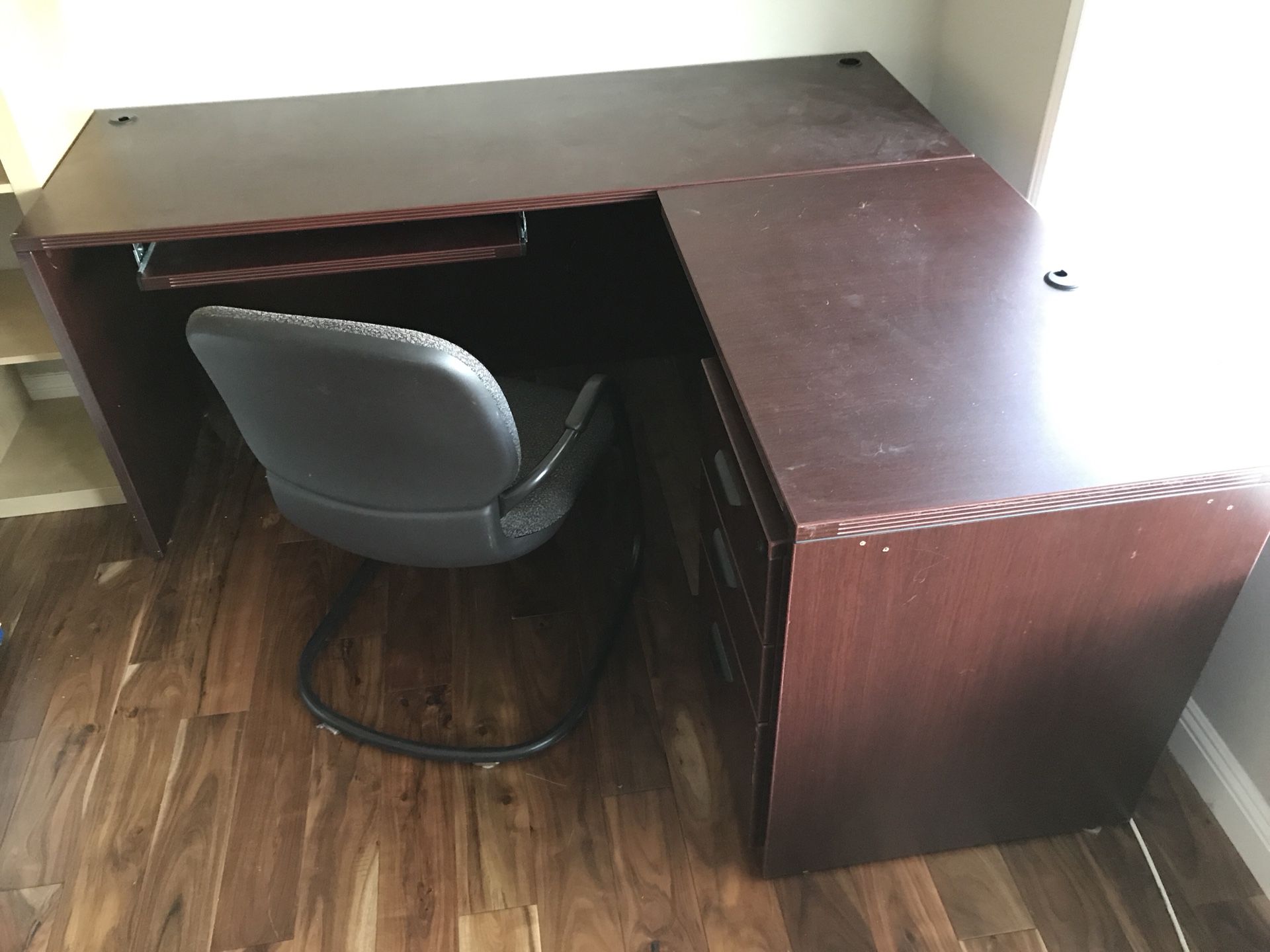 Large L-shape office desk, with file cabinet and chair