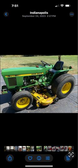 John Deere 750 Compact Tractor with Mower Deck