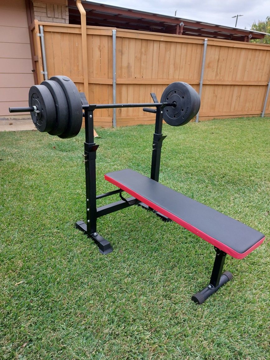 Bench And 100lb Of Weights.  Firm On Price 