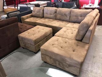 BRAND NEW REVERSIBLE SECTIONAL SOFA WITH CUP HOLDERS AND STORAGE OTTOMAN