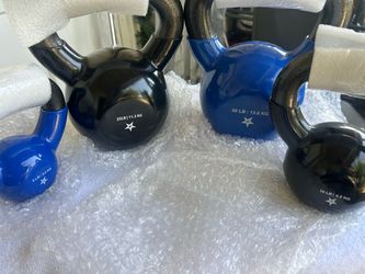 New kettlebell set they come in blue and black a 30 pounder 25 pounder 10 pounder and a five pounder