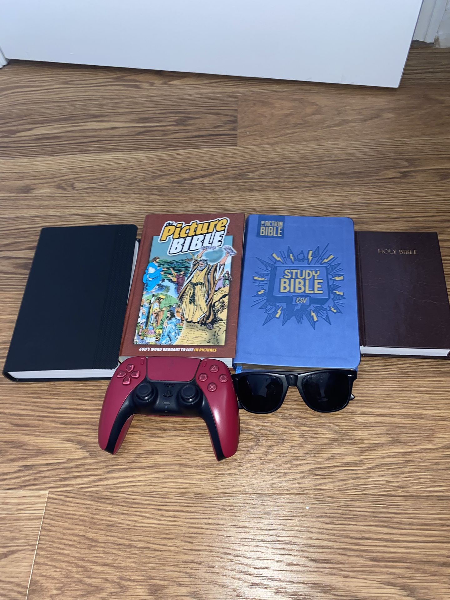 Bible’s, Sunglasses And Ps5 Controller