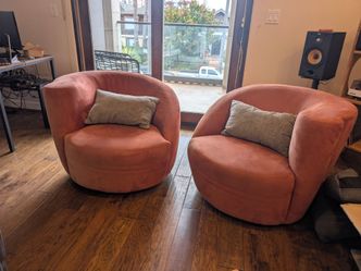 Pair of Vladimir Keegan Nautilus Swivel Chairs