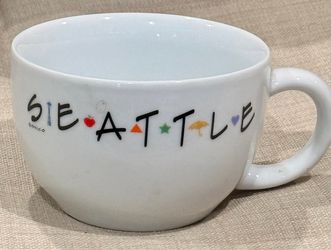 This Seattle Friends Theme Coffee Mug / Soup Bowl by 3GO is a round ceramic and porcelain mug with a capacity of approximately 12 oz. The novelty desi