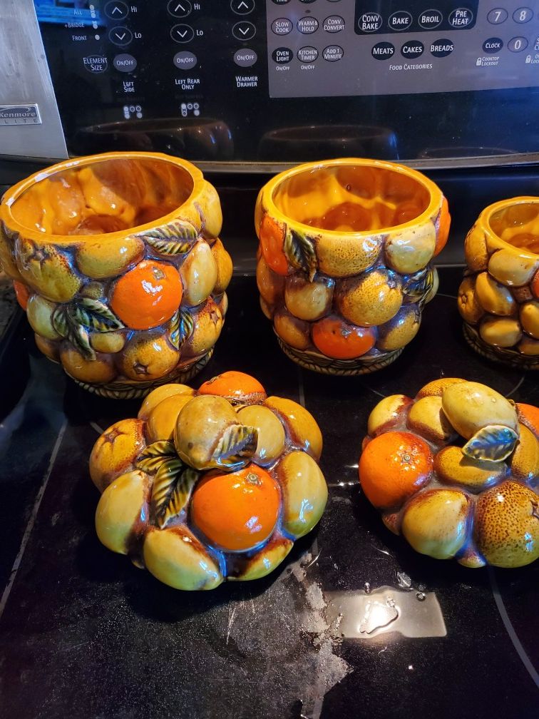 Mid century Inarco orange spice fruit basket 8 piece canister set