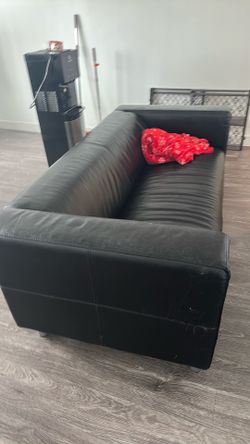 Table with chairs and Sofa must go