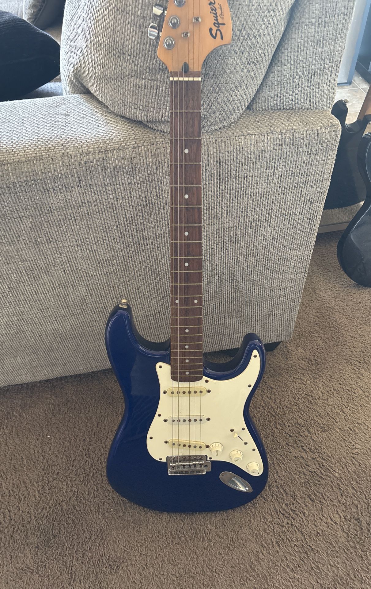 Blue Squier Electric Guitar With Case