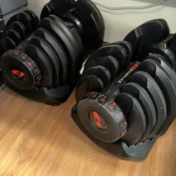 BOWFLEX ADJUSTABLE DUMBBELLS  & STAND BRAND NEW CONDITION 