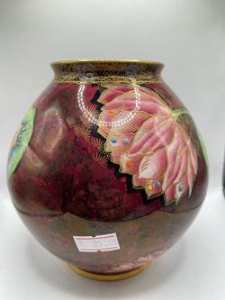 A art deco Carlton ware ceramic vase decorated in the crested bird