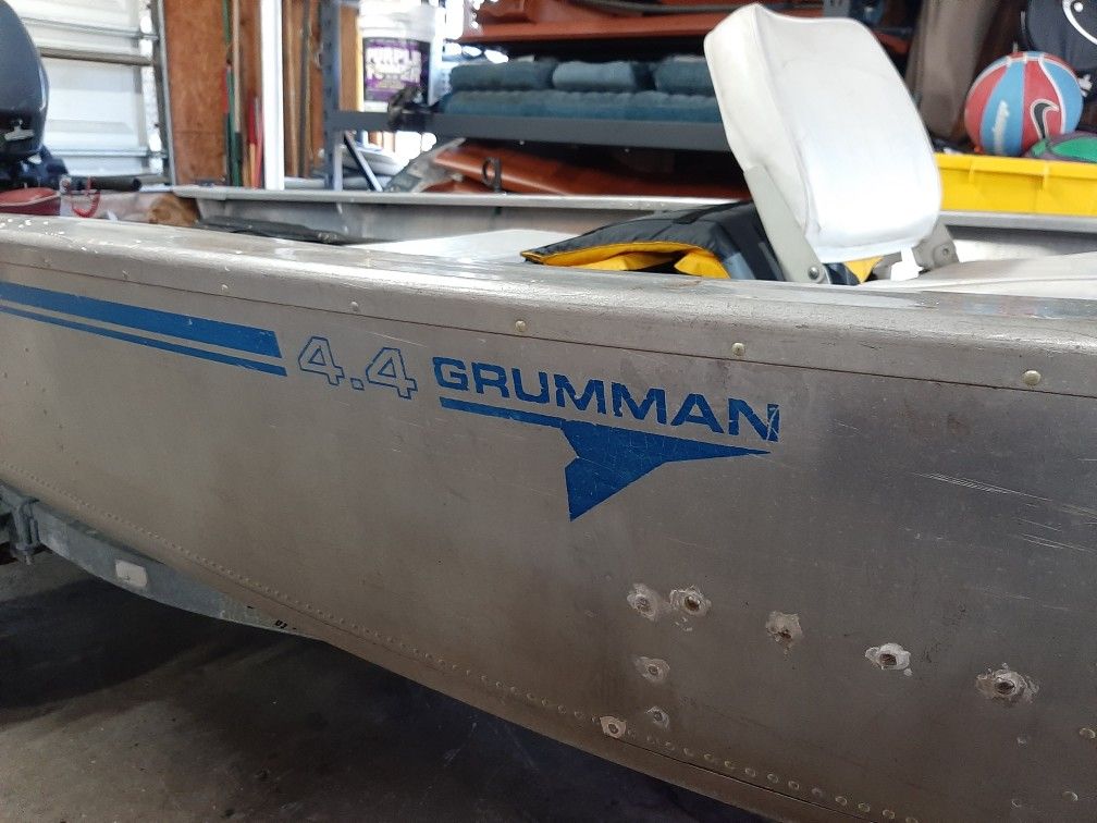 14' Aluminum Grumman W/ 15hp Yamaha And Trailer