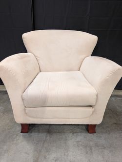 Cream Upholstered Club Chair with Rolled Arms and Flared Back