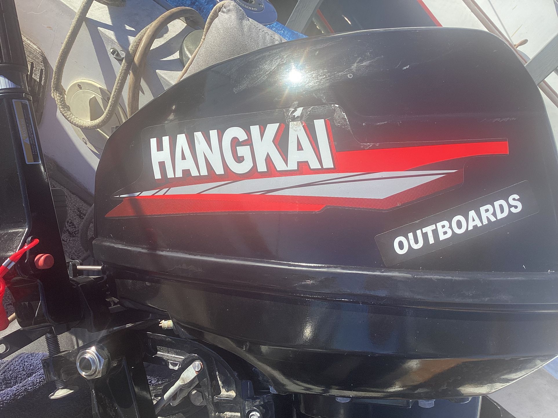 This Hankai 18 Hp Marine two Stroke outboard has Less then5 Hours On It.