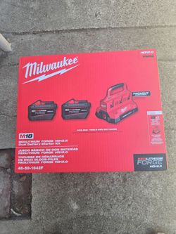 Milwaukee M18 forge batteries with 6 port rapid charger. New