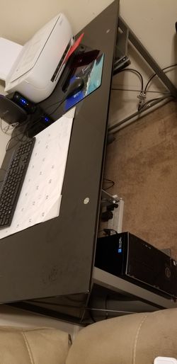 Like new medium size glass top computer desk black color moving needs to go