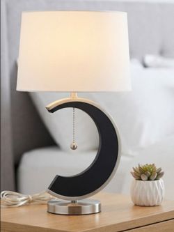Modern designer table lamp. Like new!