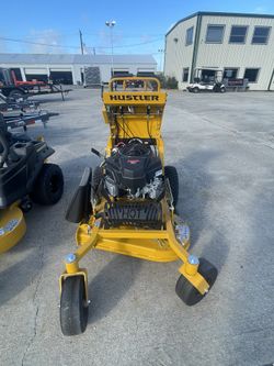 BLOWOUT SALE ON STAND ON MOWER