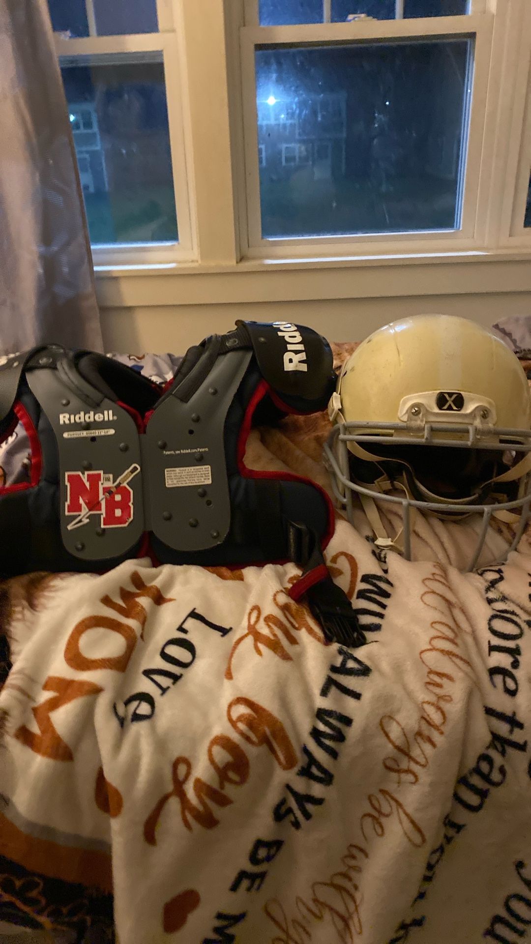 Pads and football helmet