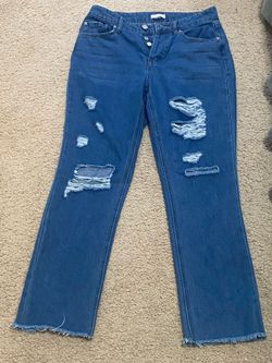 Women’s distressed boyfriend jeans