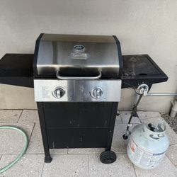 Two Burner Grill With Empty Propane Tank