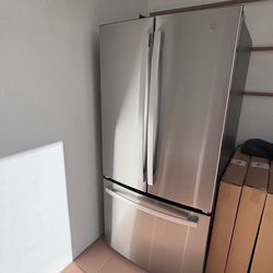 GE 24.7 cu. ft. French-Door Refrigerator with LED Lighting and Internal Water Dispenser and Icemaker