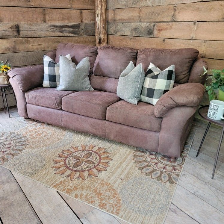 Brown cloth sofa