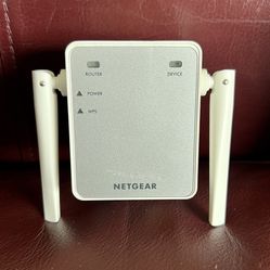 NETGEAR Wi-Fi Range Extender EX2700 Coverage Up to 800 Sq Ft and 10 devices with N300 Wireless