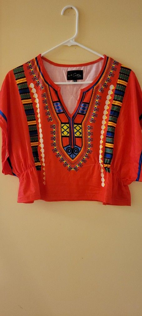 2 brand new womens shirts. One size. Red and yellow color both $15
