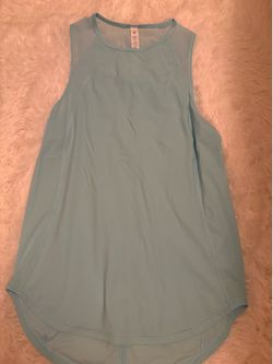 Lululemon Light Blue/Lavender Racerback Tank — Fitted athletic style, soft material. Excellent used condition.