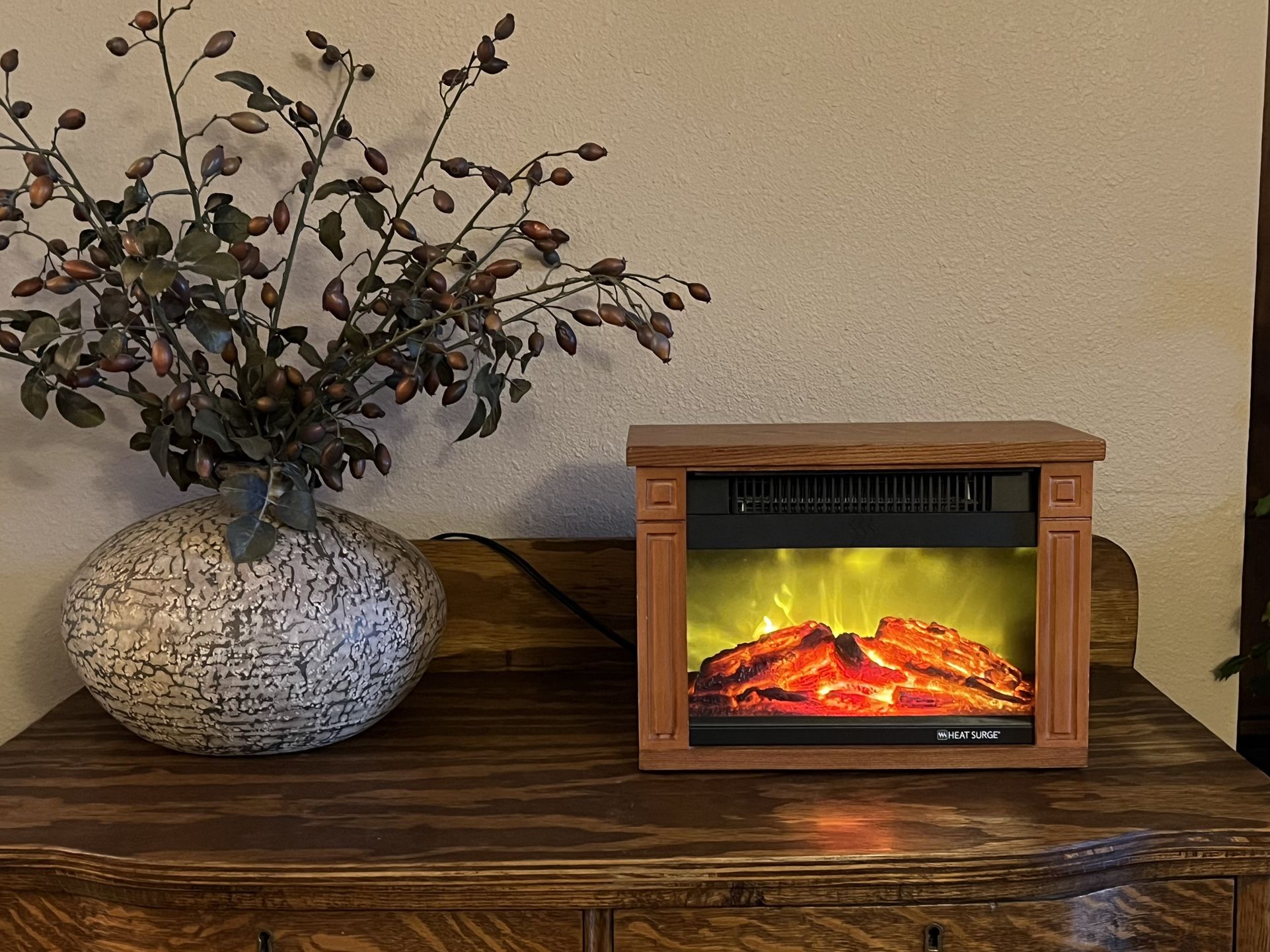 Heat Surge Mini Glo Electric Fireplace Heater