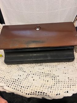 Vintage  Brown and black automotive, glove box door assembly .