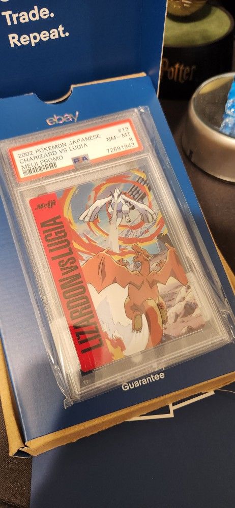 PSA 8 NM-MT Charizard vs Lugia JAPANESE Meiji Promo Pokemon Card 13 KG1 for  Sale in Lakeside, CA - OfferUp