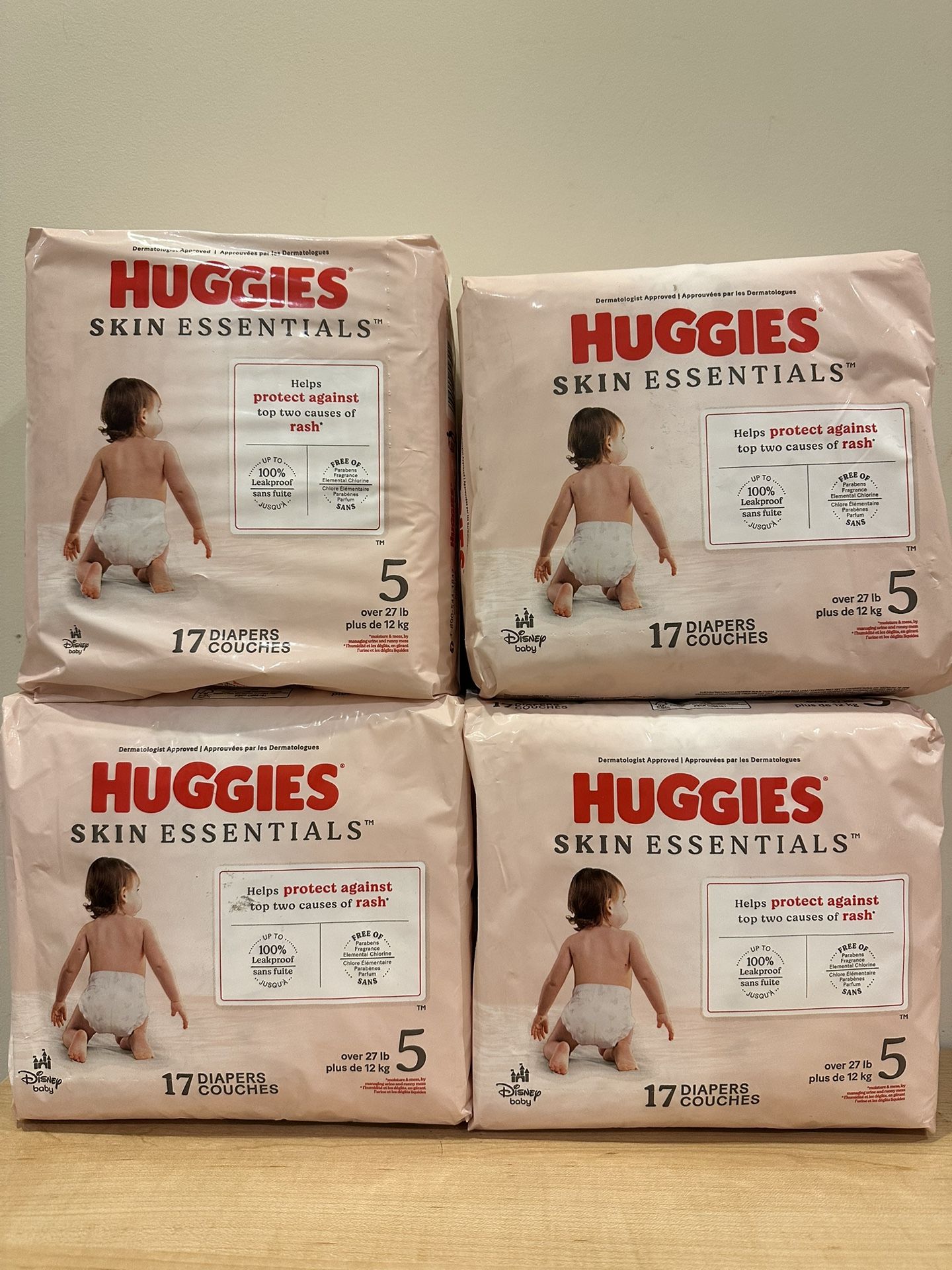 4 packages Huggies size 5 Diapers