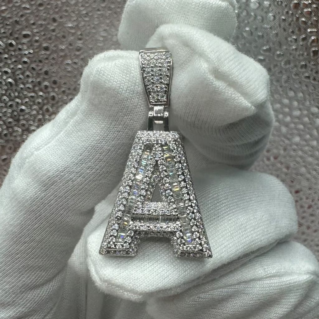 A Moissanite Initial in Sterling Silver with a CTW of 2.80 in Bugget Style
