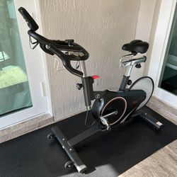 Sunny Health Magnetic Rear Belt Drive Indoor Cycling Exercise Bike With RPM Cadence Sensor