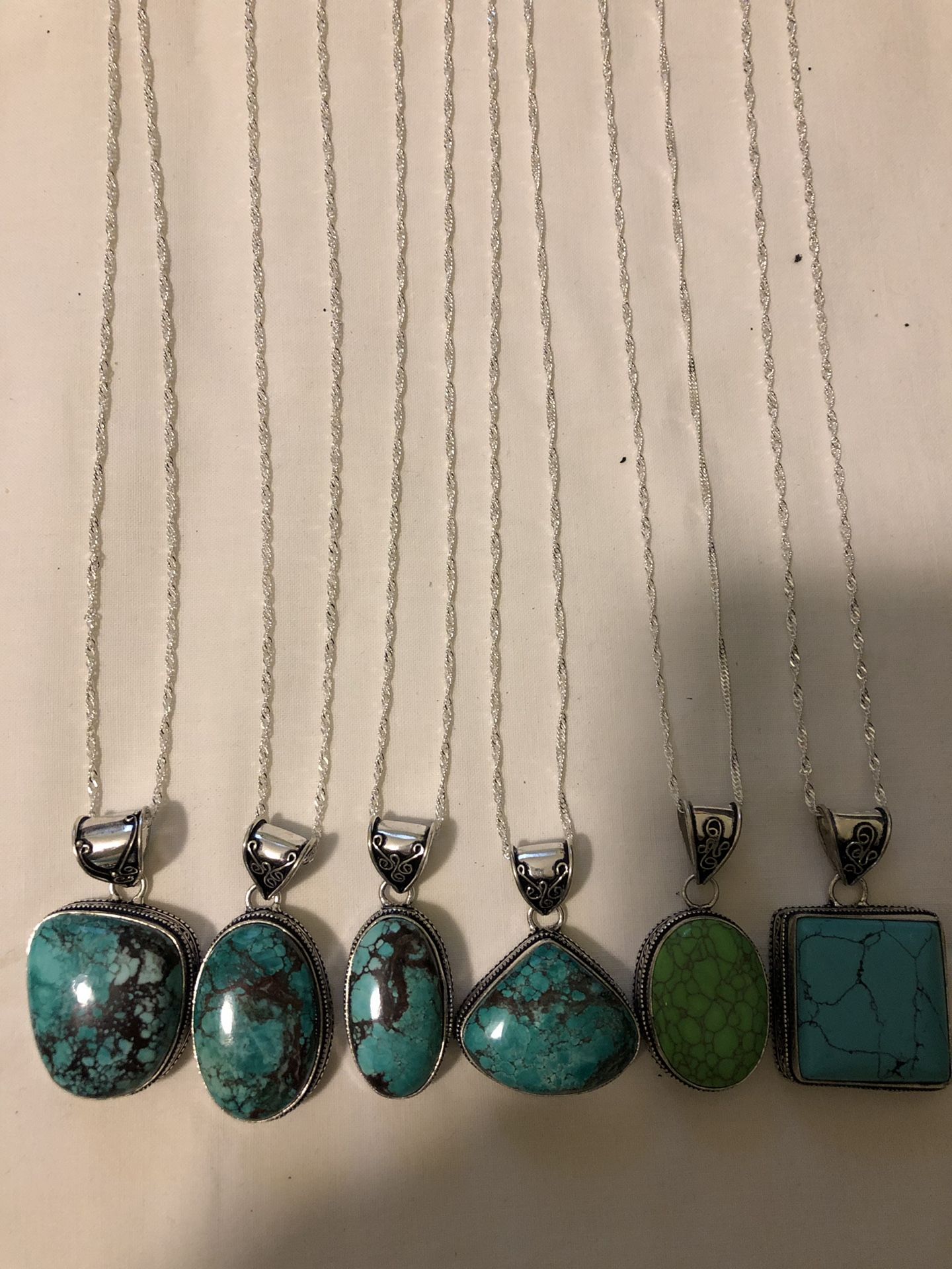 Turquoise pendant on 24 inch sterling silver chain 20.00 each