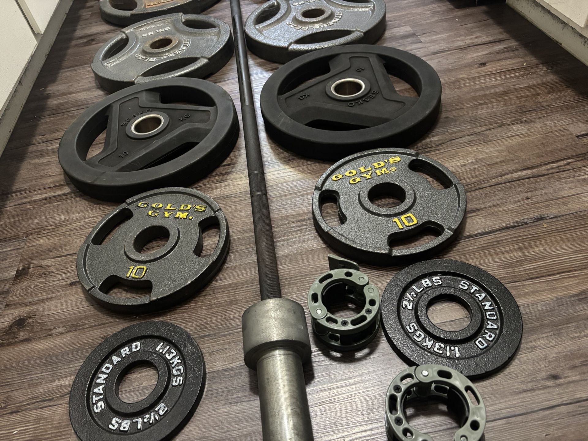 Olympic Weights With 6.5 Ft 35 Lb Barbell 2x45, 2x35, 2x22, 2x10 And 2x2.5 Lbs Collar Locks Included