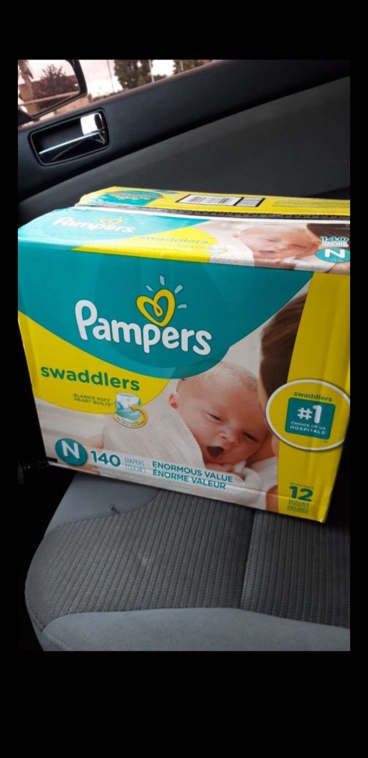 New PAMPERS SWADDLERS 140 COUNT