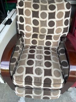 Brown/beige/tan fabric recliner