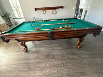 Nice pool table with memorabilia, $1320 obo