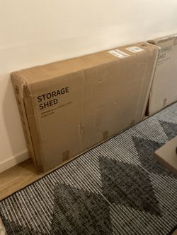 Unopened boxes - outdoor shed - light gray