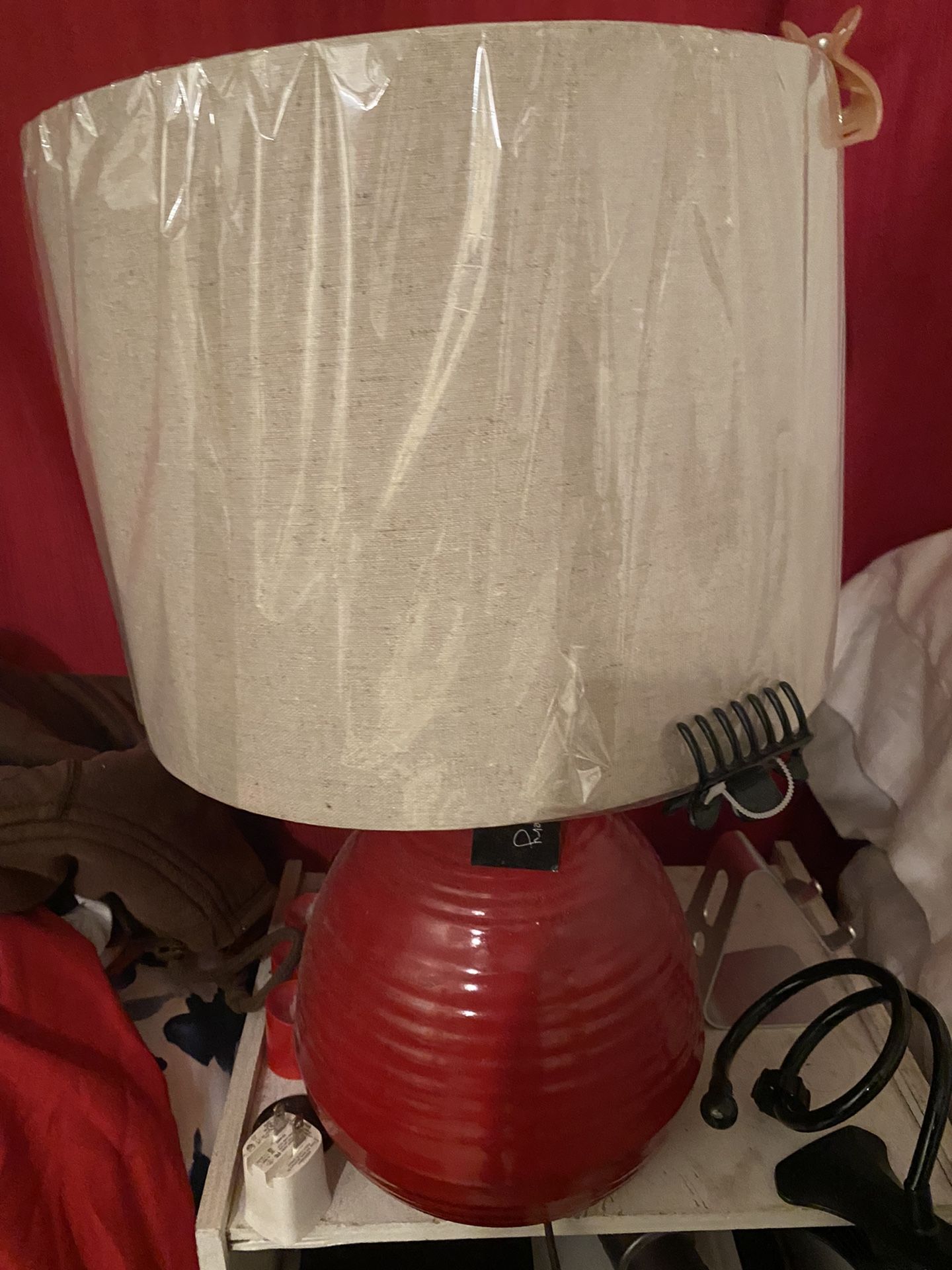 2 Red Lamps. I Good Condition With Plastic and Tags On. Moving