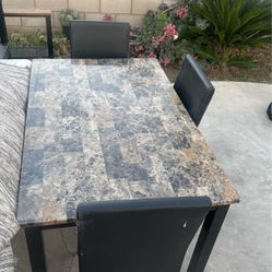 Table And 4 Chairs 