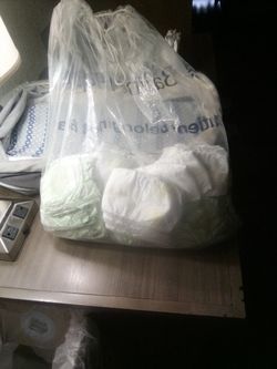 Free Bag Of Newborn Pampers and Grinch Diapers