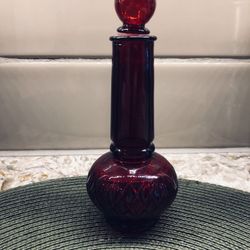 Avon ruby red perfume bottle. “Occur” fragrance label still on bottom