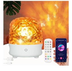 New Ocean Lamp, Bluetooth Speaker with 16 RGB Color Change Ceiling Projector Light, Mini Speaker with Remote. Located in yucaipa
