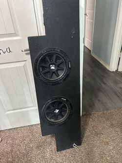 Dual Kicker Comp Subwoofers in rhino box