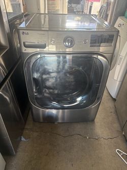 Lg Mega capacity  Steam  Gas dryer Excellent working condition  W29 D33 H40 1/2 9.0 cu ft 3 months warranty parts and labor only