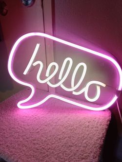 Hello sign neon pink and soft white connects to USB just like a phone you can put it into a battery pack and stick it on the back of your bike and dri