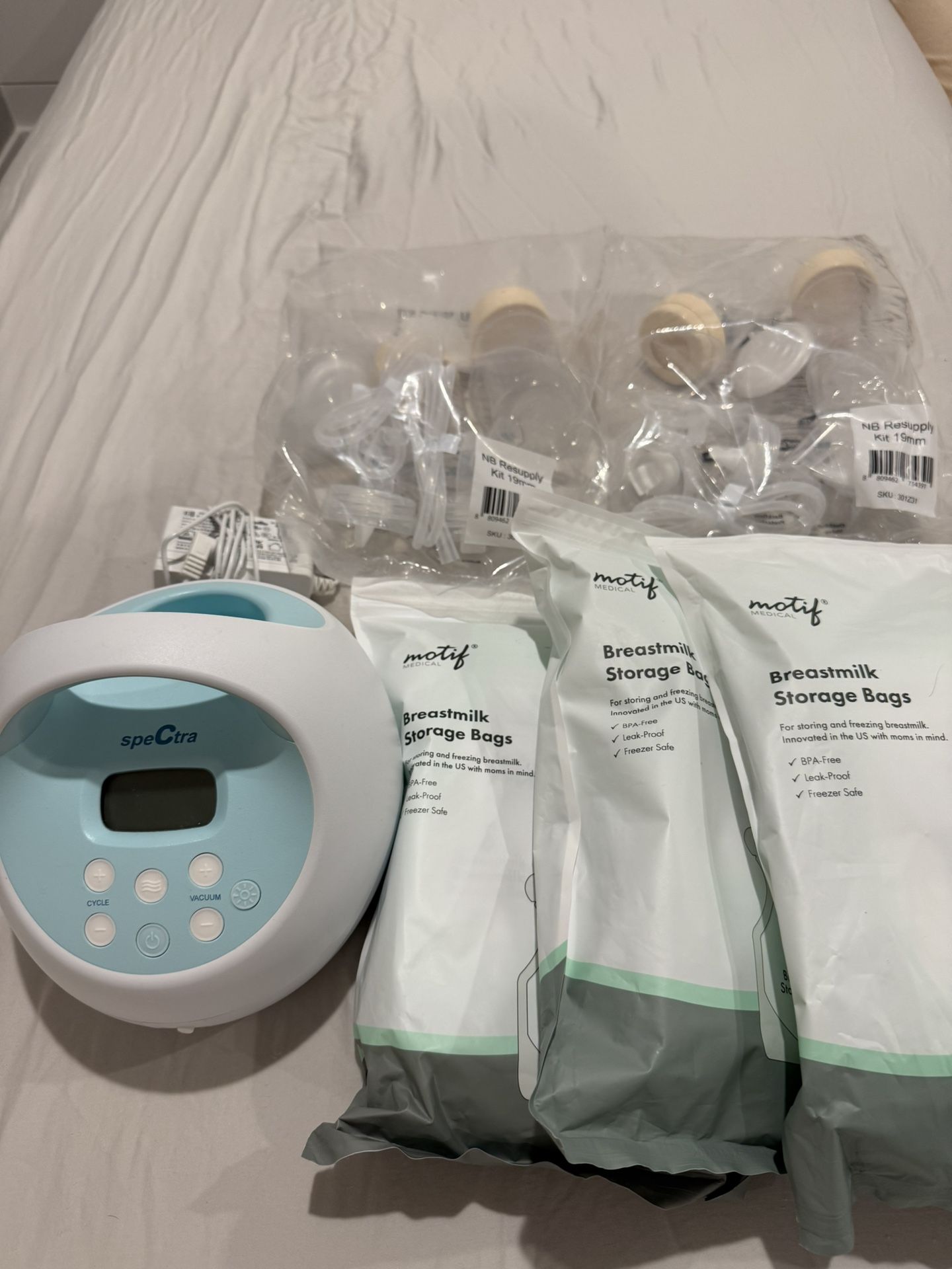 Spectra S1 Breast Pump + Unopened Pump Parts 19mm Flange x2 + Unopened Milk Storage Bags